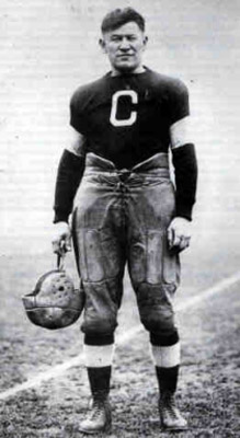 Thorpe posing in his football uniform.