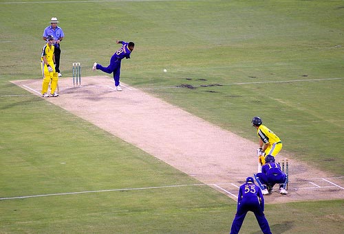 Muttiah Muralitharan bowls to Adam Gilchrist.