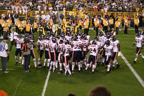 Chicago Bears huddle.