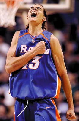 Florida's Joakim Noah reacts.