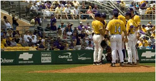 LSU head coach Paul Manieri talks with his infield.